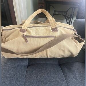 Canvas utility duffle travel bag .